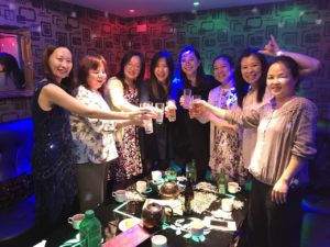 Happy friends gathering and singing